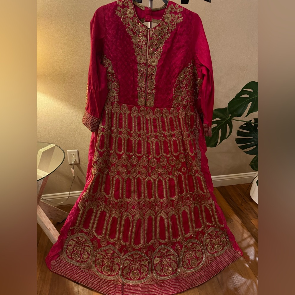 Rich expensive hot pink gownEmbroidered and heavy hand work on raw silk fabric